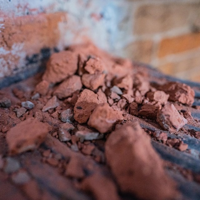 Pile of brick dusk on mental stairs