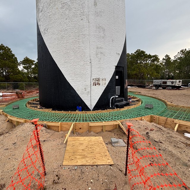 Wooden box at the base of the lighthouse to support scaffolding 