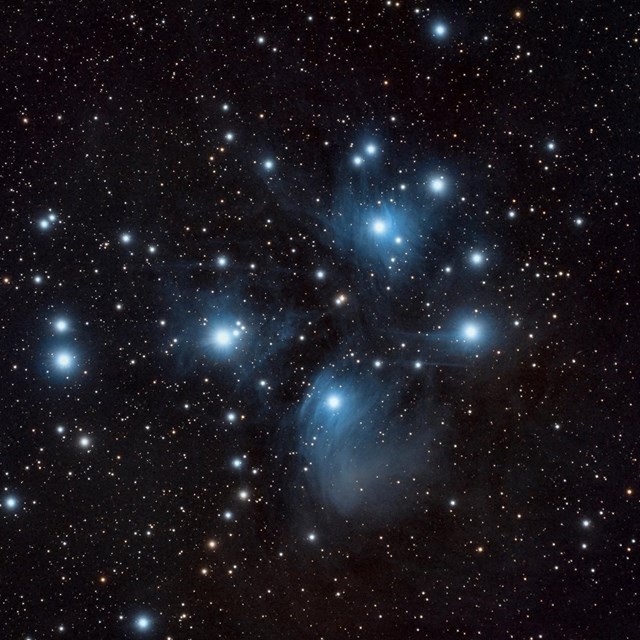 Pleides star cluster taken through a telescope