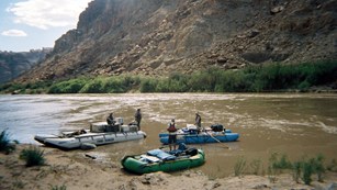 Boaters talking with rangers near the Confluence