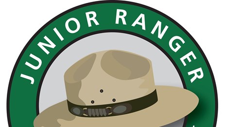 Junior Ranger Logo with flat hat and text Explore, learn, protect