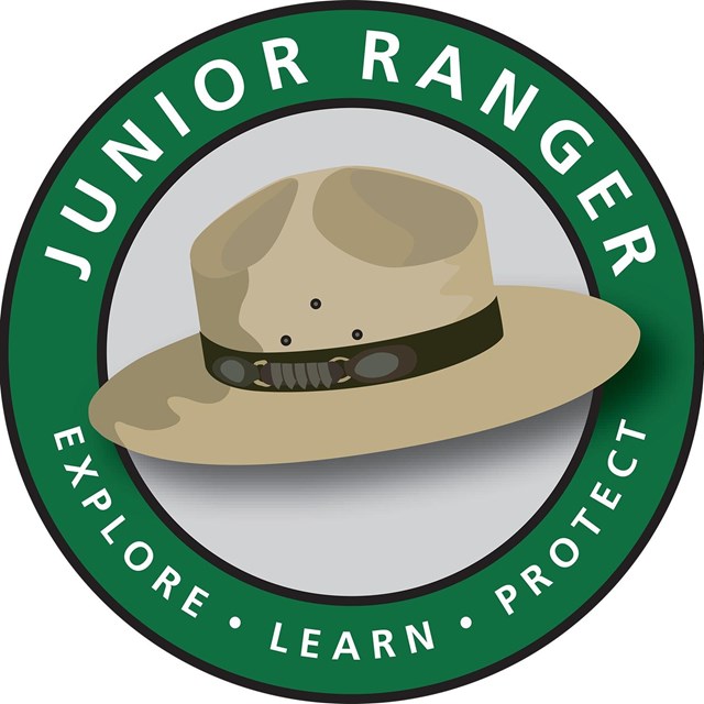 Junior Ranger Logo with flat hat and text Explore, learn, protect