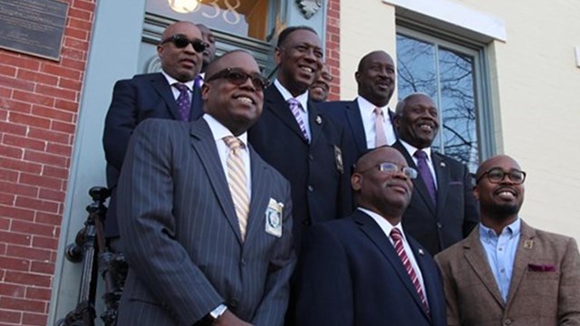 Park partners gathered out front of the historic site.