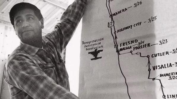Cesar Chaves points to a map of the 1966 marching route from Delano, CA to Sacramento, CA.
