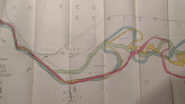 Paper map using colors to show the varying paths of a river over time