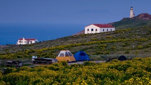 Campground with lighhouse on Anacapa Island. ©Tim Hauf, timhaufphotography.com