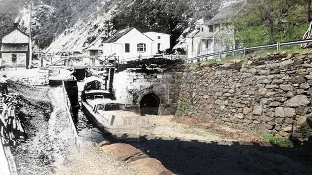 Historic picture of the canal fading from left to right into modern canal appearance.
