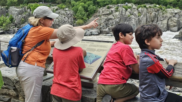 Canal Classroom Corps teacher and three students at the Great Falls Overlook.