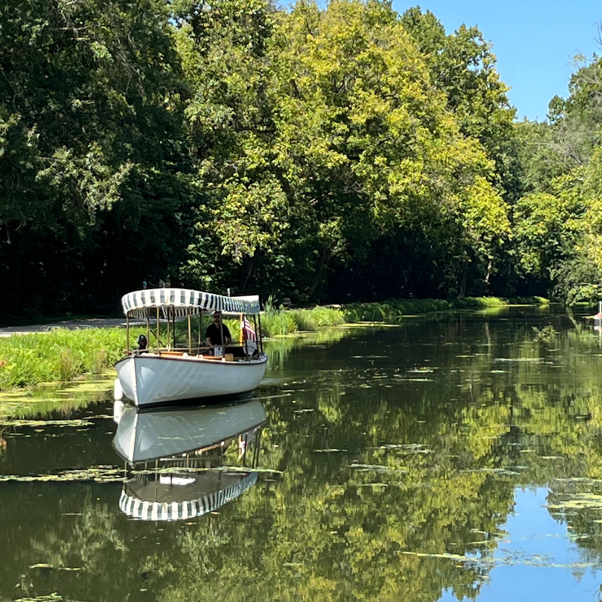 A small boat in the canal near Great Falls