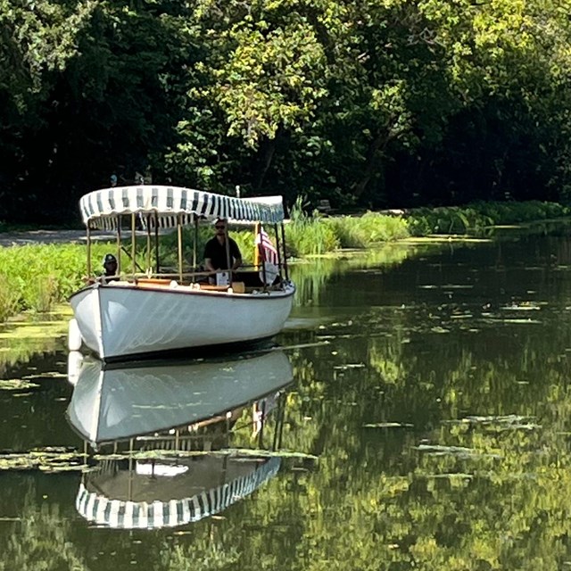 A small boat in the canal near Great Falls