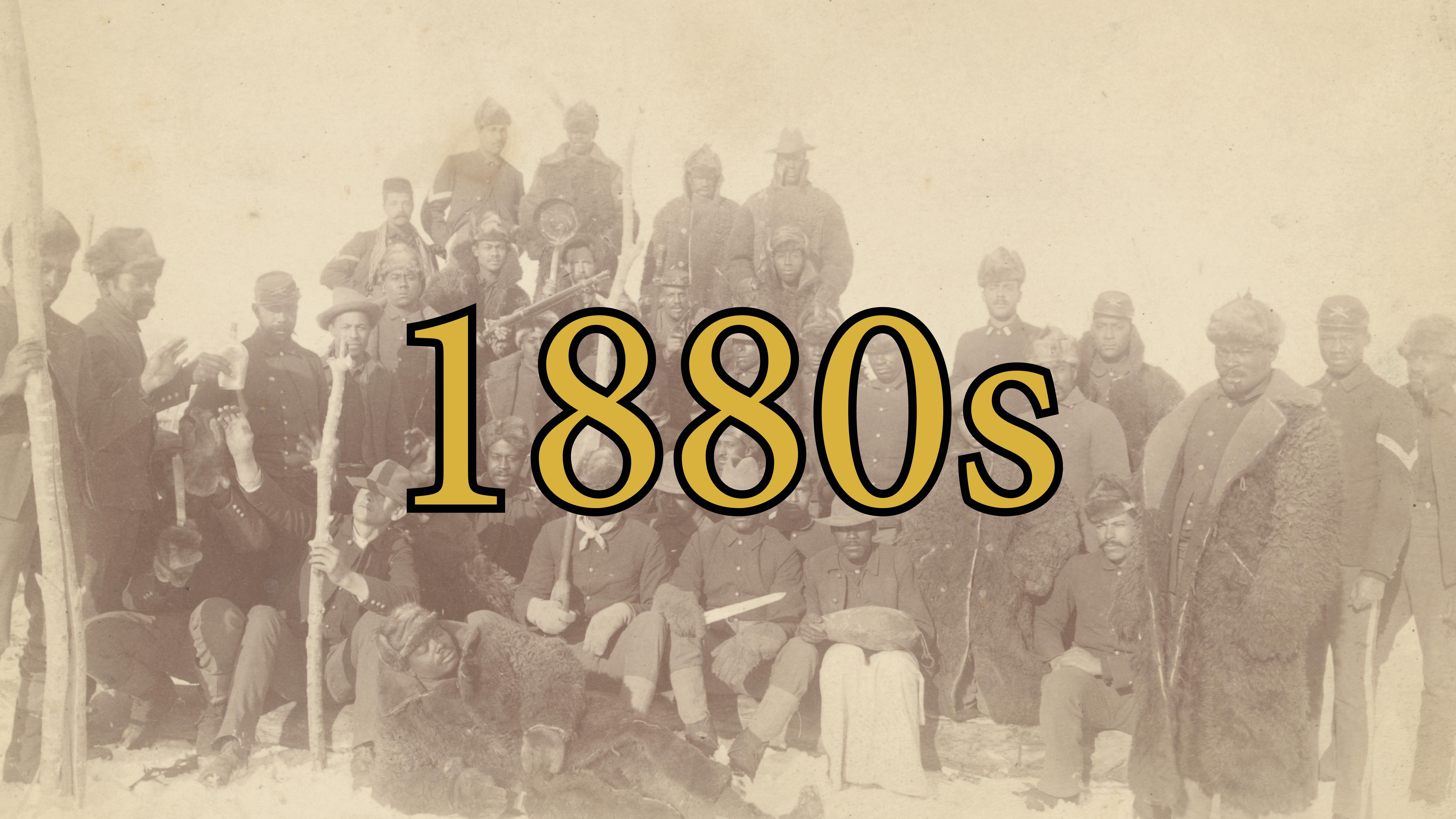 Sepia colored photograph with African American soldiers standing in three rows. 1880s is written