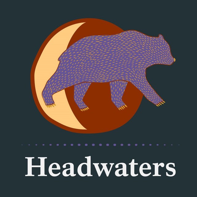 The logo for Headwaters, with a silhouette of a bear and the moon