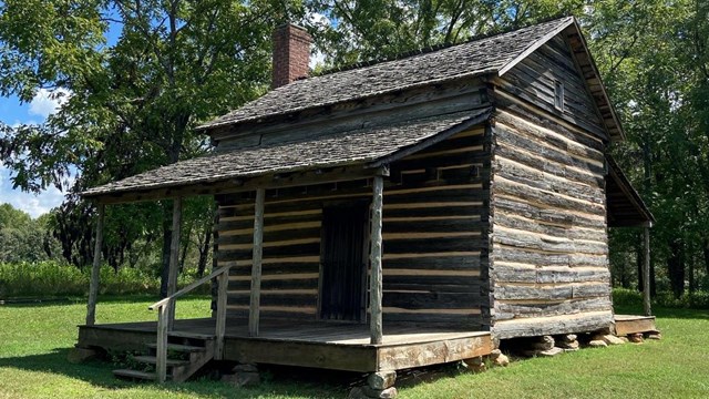 Image of exterior of Robert Scruggs house. 