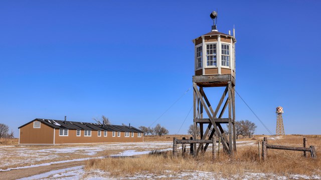 A guard watchtower and barracks 