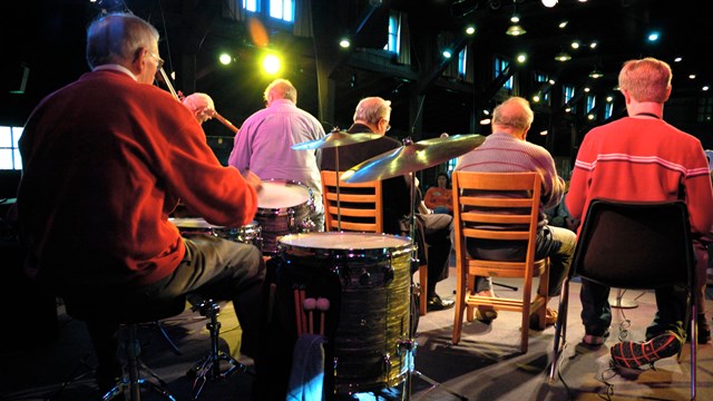 A band plays on stage at Happy Days Lodge.