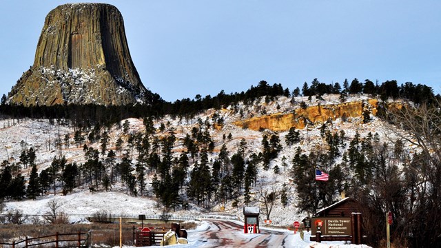 The Devils Tower Entrance Station with Devils Tower in the background.