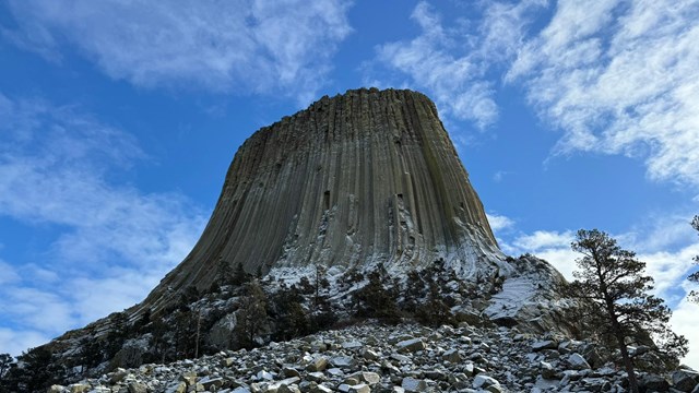 Devils Tower looms 867 feet above the trees.