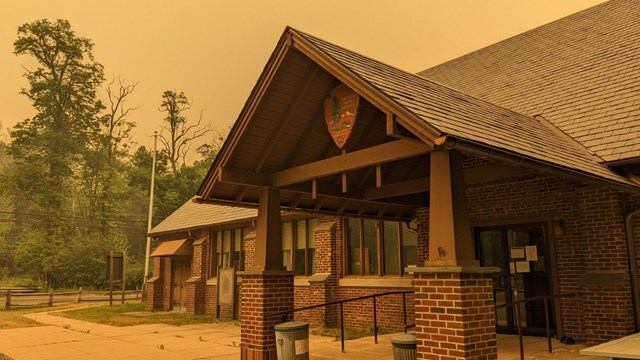 The Bushkill Meeting Center under an orange haze during the wildfire smoke.