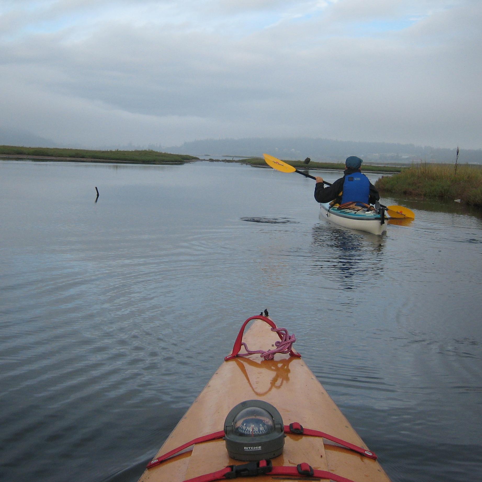 Kayaks in canal.