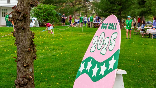 A large painted wood egg at the 2025 Eisenhower Easter Egg Roll