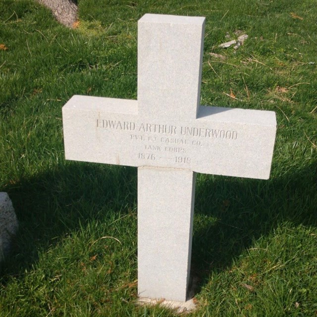 A white headstone for Edward Underwood