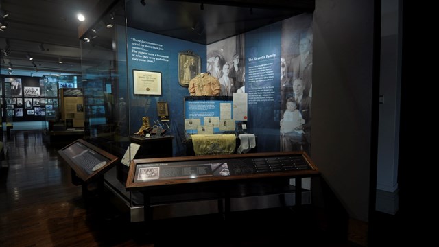 The 'Treasures From Home' exhibit on Ellis shows artifacts that immigrants donated.