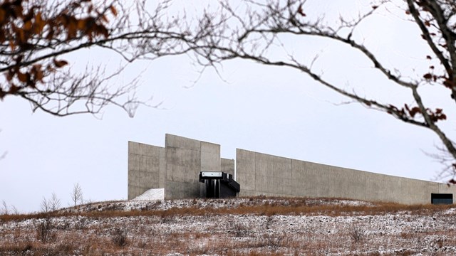 The Visitor Center sits atop of a snow-covered hill. 