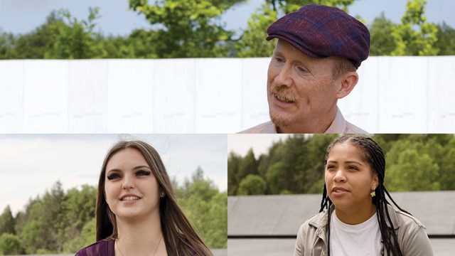 Three family members speaking with the white Wall of Names in the background.