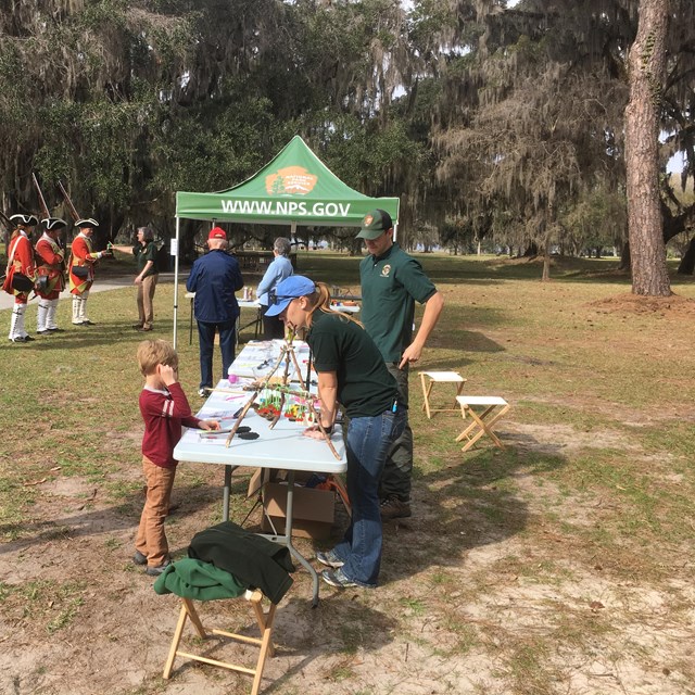 Image of a ranger giving a kid's program