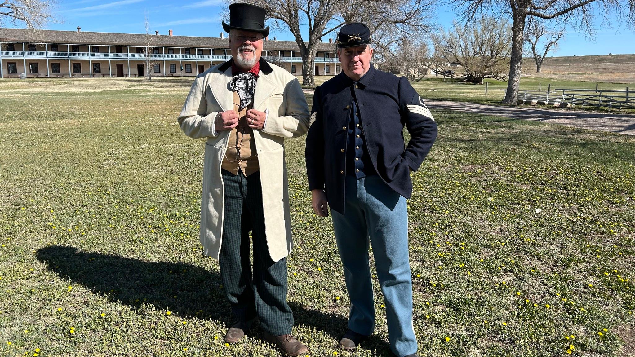 Image of two rangers dress in a soldier uniform and citizen uniform.  