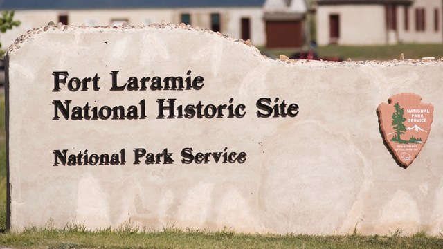 Image of a sign with writing Fort Laramie National Historic Site National Park Service 