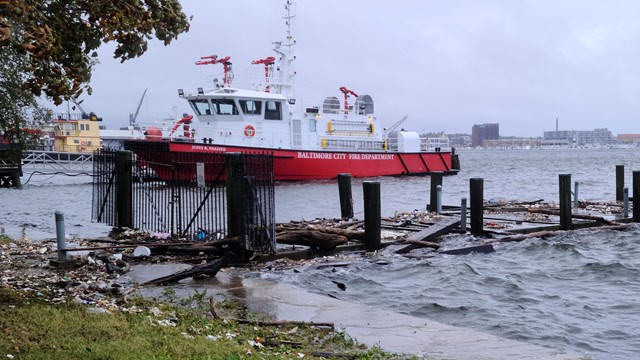 Boat with trash washed ashore