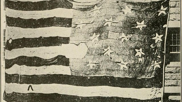 Historic image of the Star-Spangled Banner flag in 1914.
