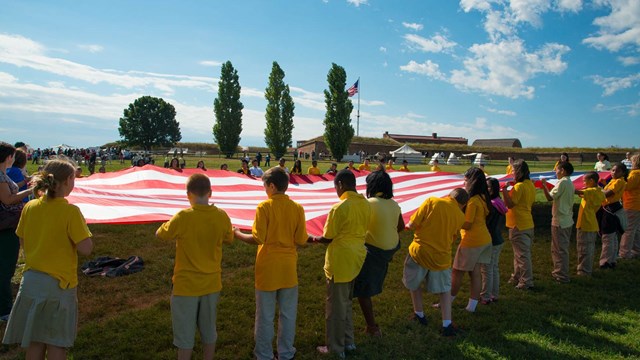 Students participating in a flag talk