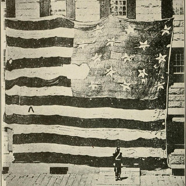 Historic image of the Star-Spangled Banner flag in 1914.