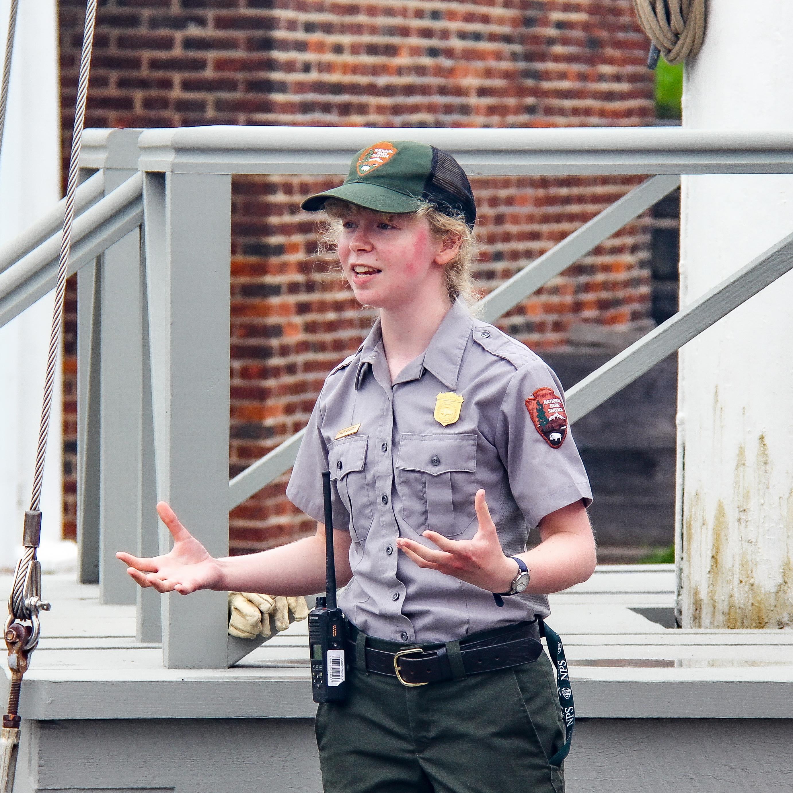 A ranger giving a program inside historic star fort.