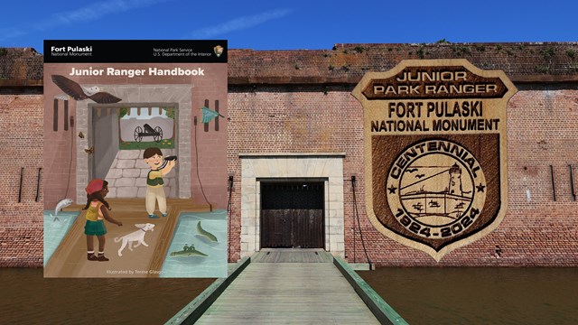 A booklet and wooden badge on top of a picture of the front of a fort. 