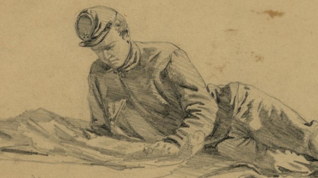 Sketch of a Civil War soldier laying and reading a letter from home.