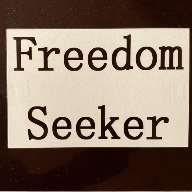 The words Freedom Seeker 
