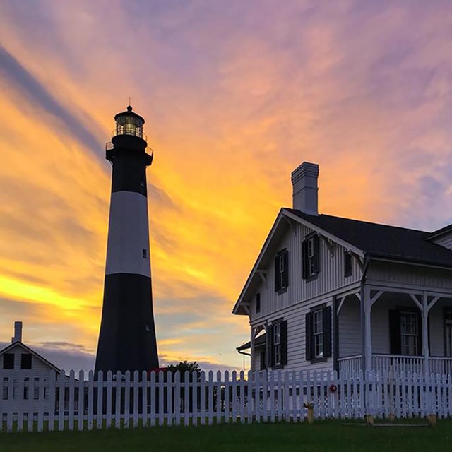 A sunset image of the Tybee Island Lighthouse