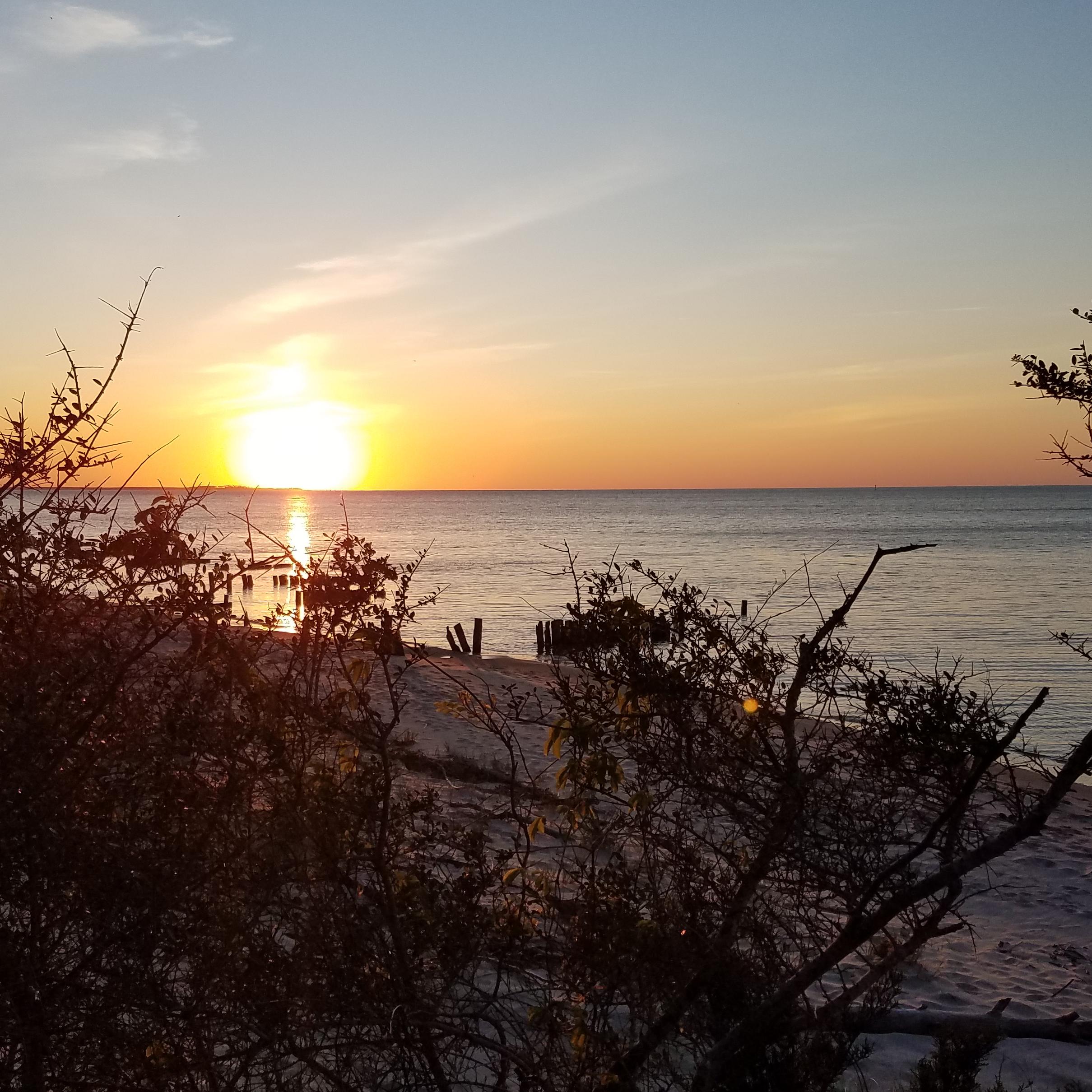 A sunset over a body of water