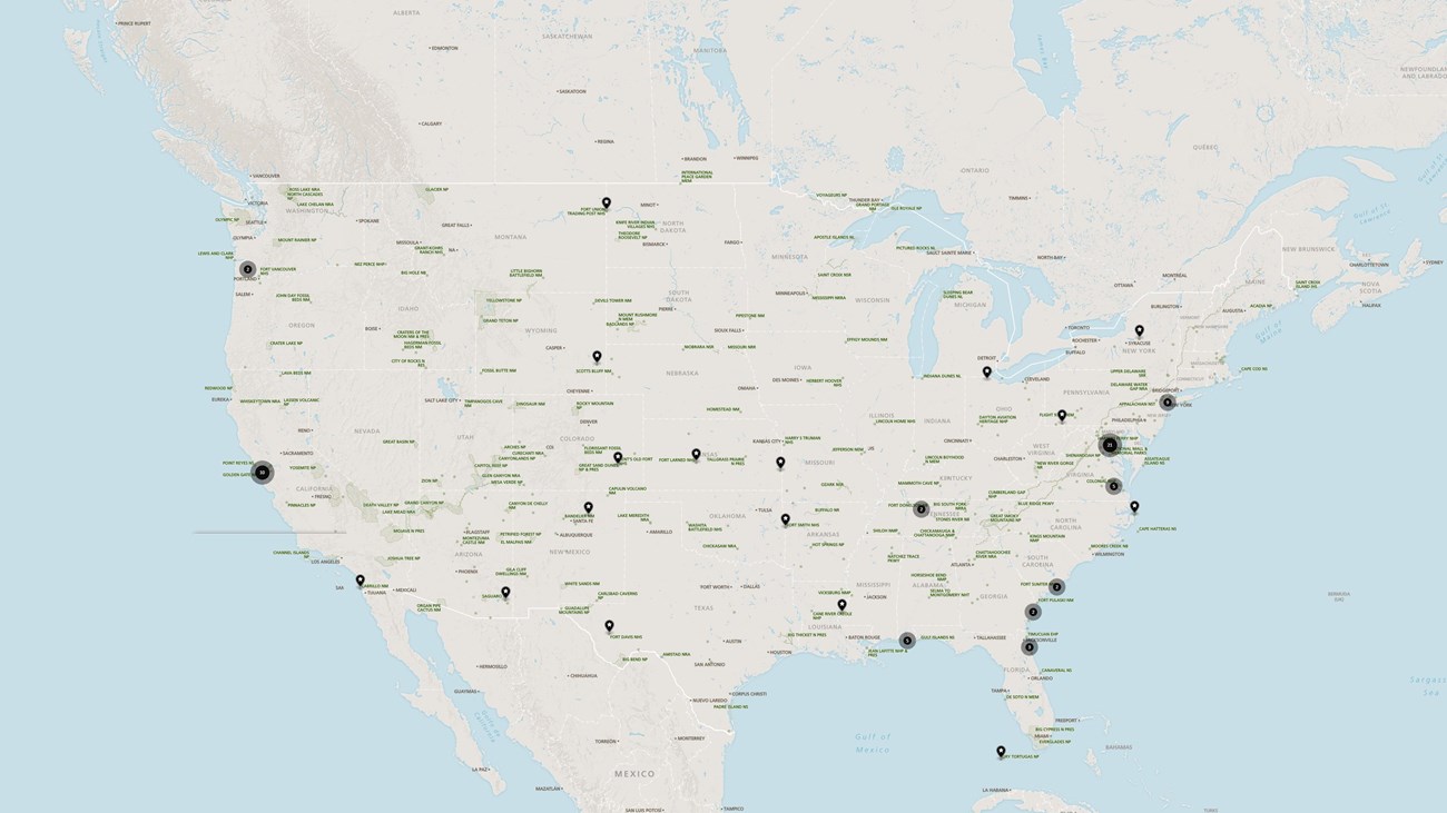 map of US with black circles and points 
