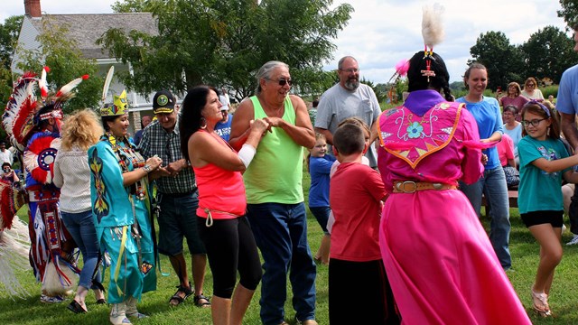 Oklahoma Native American Fancy Dancers, dancing with park visitors.