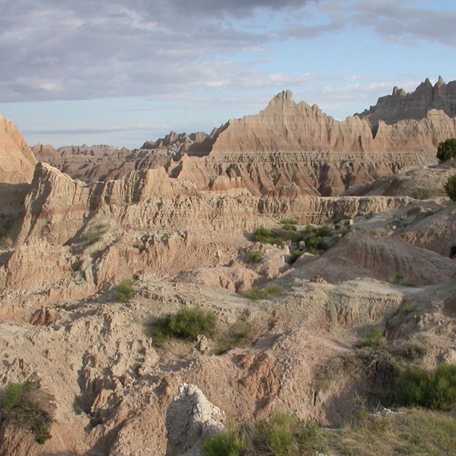 Photos of badlands eroded landscape.