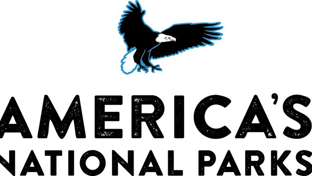 A logo of an eagle flying over the words "America's National Parks."