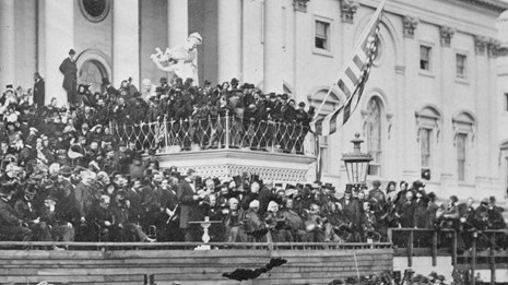 Crowds gathered on the steps of the Capitol with Lincoln at center delivering his inaugural address