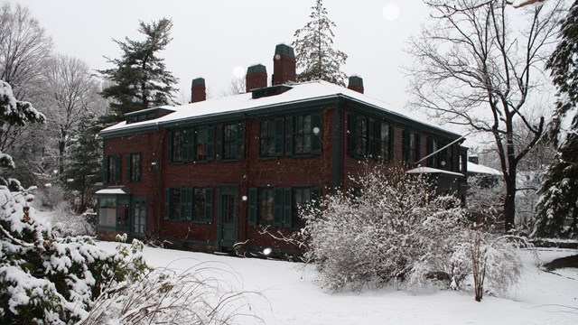 Winter picture of historic house and landscape.