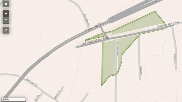 A map of an irregular shaped piece of land near AL Hwy 202 and Old Birmingham Highway.