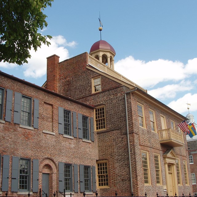 An angled view looking up at the New Castle Court House. 