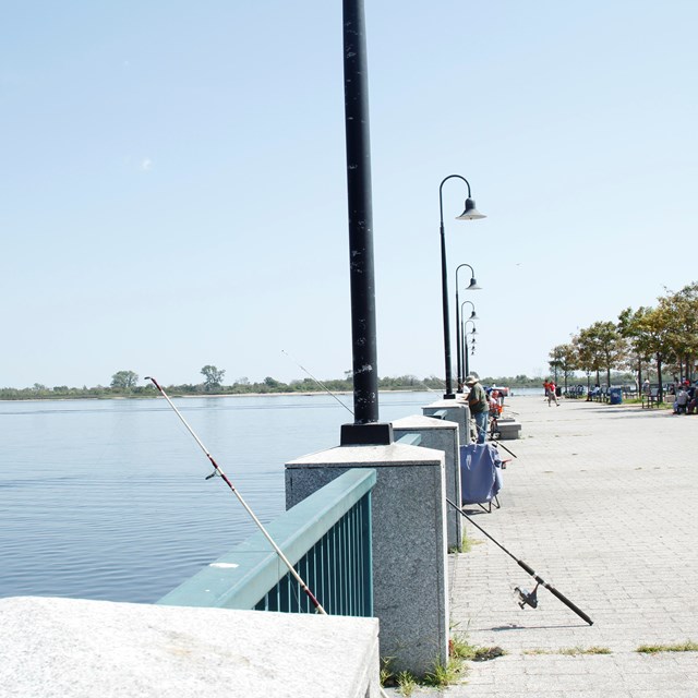 Fishing rods and light posts at Canarsie pier